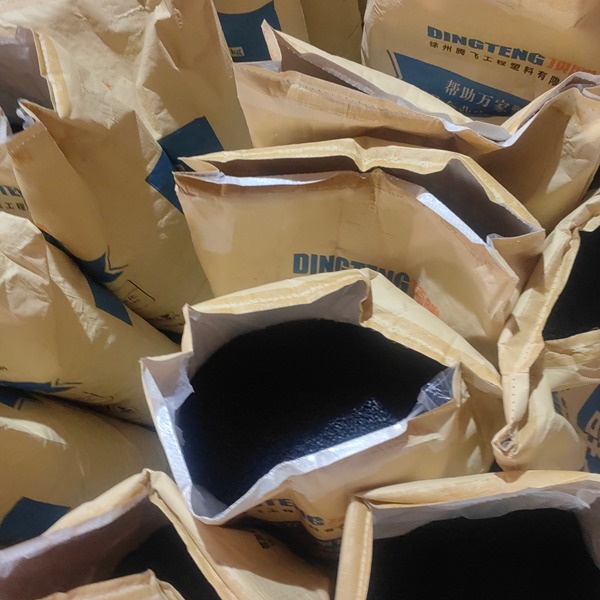 High-grade Polyamide 66 plastic pellets in factory storage hopper