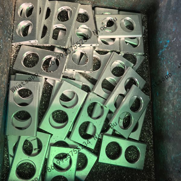 Steel cable drag chain with perforated internal partition separators